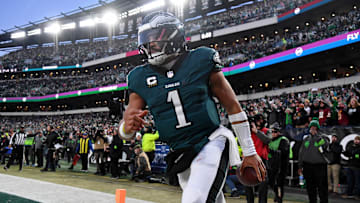 Jan 26, 2025; Philadelphia, PA, USA; Philadelphia Eagles quarterback Jalen Hurts (1) reacts after a touchdown against the Washington Commanders during the second half in the NFC Championship game at Lincoln Financial Field. Mandatory Credit: Eric Hartline-Imagn Images