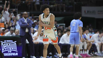 Feb 10, 2024; Coral Gables, Florida, USA; Miami Hurricanes guard Nijel Pack (24) reacts after scoring against the North Carolina Tar Heels during the first half at Watsco Center. Mandatory Credit: Sam Navarro-Imagn Images