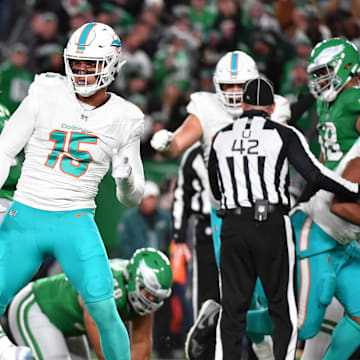 Miami Dolphins linebacker Jaelan Phillips (15) celebrates a sack and fumble recovery against the Philadelphia Eagles during the first quarter at Lincoln Financial Field in a 2023 game.