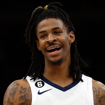 Nov 6, 2022; Memphis, Tennessee, USA; Memphis Grizzlies guard Ja Morant (12) waits for play to resume during halftime against the Washington Wizards at FedExForum. Mandatory Credit: Petre Thomas-Imagn Images
