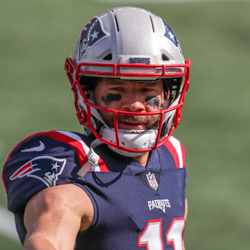 Oct 18, 2020; Foxborough, Massachusetts, USA; New England Patriots receiver Julian Edelman (11) warms up prior to the game against the Denver Broncos at Gillette Stadium. Mandatory Credit: Paul Rutherford-Imagn Images