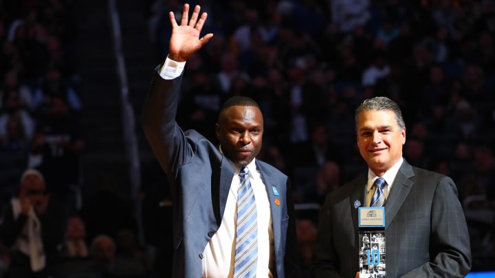 Feb 21, 2020; Orlando, Florida, USA; Orlando Magic player Darrell Armstrong  is inducted into Orlando Magic Hall of Fame by CEO Alex Martins during the first half at Amway Center. Mandatory Credit: Kim Klement-USA TODAY Sports