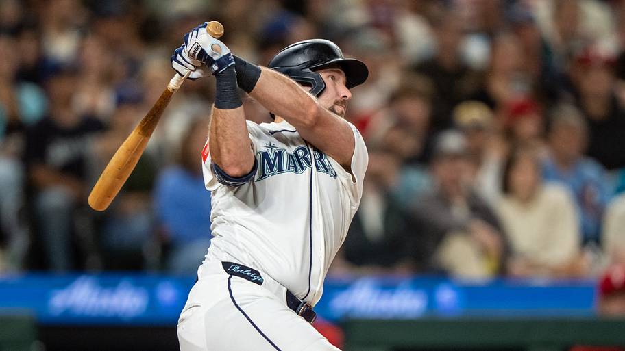 Mariners catcher Cal Raleigh swings