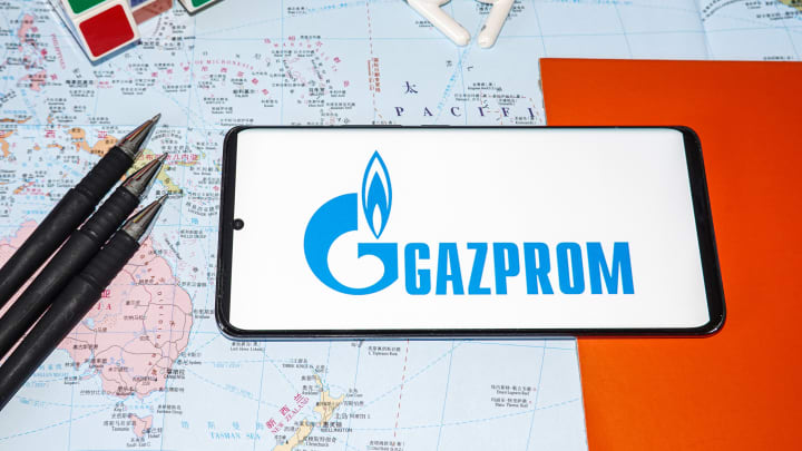 In this photo illustration, a Gazprom logo is displayed on...