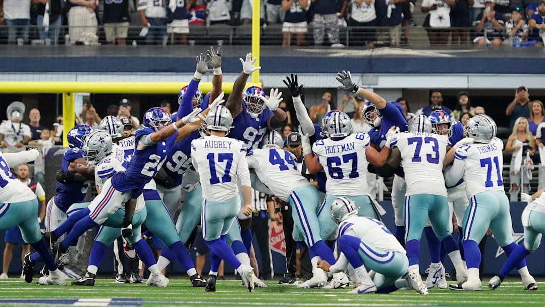 Sep 14, 2025; Arlington, Texas, USA; Dallas Cowboys place kicker Brandon Aubrey (17) kicks the game-winning field goal against the New York Giants during overtime at AT&T Stadium.  