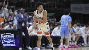 Feb 10, 2024; Coral Gables, Florida, USA; Miami Hurricanes guard Nijel Pack (24) reacts after scoring against the North Carolina Tar Heels during the first half at Watsco Center. Mandatory Credit: Sam Navarro-Imagn Images