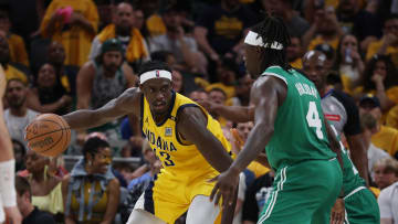 May 25, 2024; Indianapolis, Indiana, USA; Indiana Pacers forward Pascal Siakam (43) controls the ball against Boston Celtics guard Jrue Holiday (4) during the fourth quarter of game three of the eastern conference finals in the 2024 NBA playoffs at Gainbridge Fieldhouse. Mandatory Credit: Trevor Ruszkowski-USA TODAY Sports