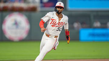 Jul 26, 2025; Minneapolis, Minnesota, USA; Minnesota Twins right fielder Willi Castro (50) rounds third on his way to home. He would be called back as left fielder Harrison Bader (12) would have his hit ruled a ground rule double in the eighth inning against the Washington Nationals at Target Field. Mandatory Credit: Matt Blewett-Imagn Images