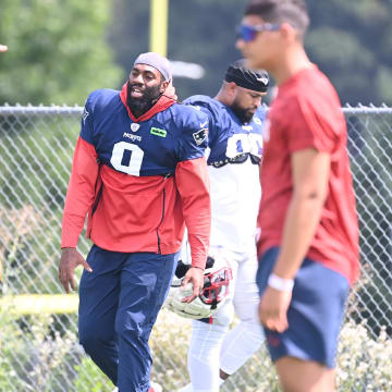 Aug 03, 2024; Foxborough, MA, USA; New England Patriots linebacker Matthew Judon (9) warms up during training camp at Gillette Stadium. Mandatory Credit: Eric Canha-USA TODAY Sports