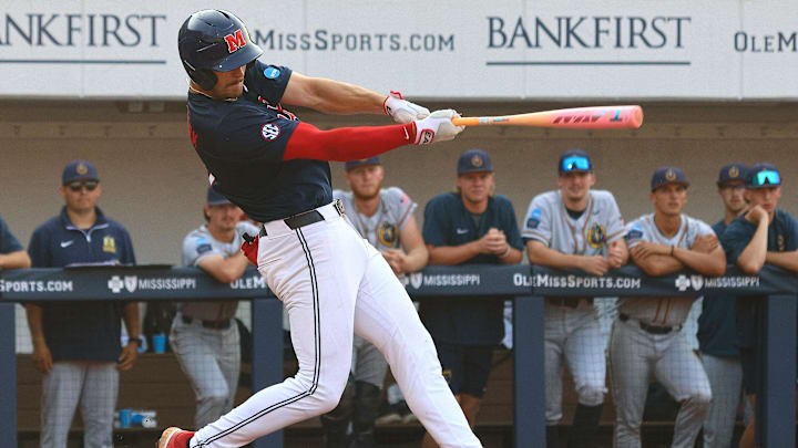 Jun 2, 2025; Oxford, MS, USA; Mississippi Rebels second base Judd Utermark (27) hits a home run during the fourth inning against the Murray State Racers. Mandatory Credit: Petre Thomas-Imagn Images