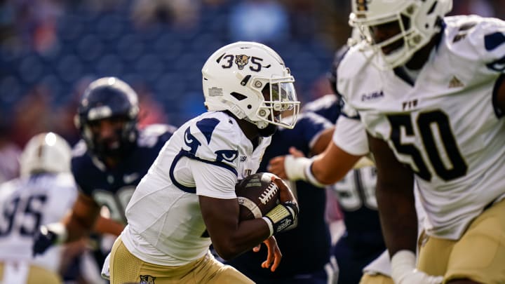 Sep 16, 2023; East Hartford, Connecticut, USA; FIU Golden Panthers quarterback Keyone Jenkins (1) runs the ball against the UConn Huskies in the first quarter at Rentschler Field at Pratt & Whitney Stadium. Mandatory Credit: David Butler II-USA TODAY Sports