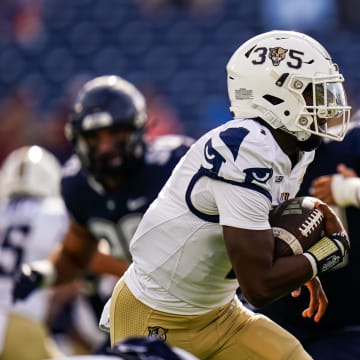 Sep 16, 2023; East Hartford, Connecticut, USA; FIU Golden Panthers quarterback Keyone Jenkins (1) runs the ball against the UConn Huskies in the first quarter at Rentschler Field at Pratt & Whitney Stadium. Mandatory Credit: David Butler II-USA TODAY Sports