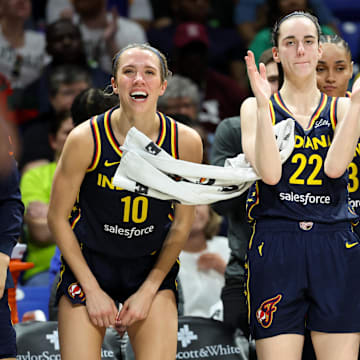 May 3, 2024; Dallas, Texas, USA; Indiana Fever guard Caitlin Clark (22) and Indiana Fever guard Lexie Hull (10) and Indiana Fever guard Erica Wheeler (17) react during the second half against the Dallas Wings at College Park Center.  Mandatory Credit: Kevin Jairaj-Imagn Images