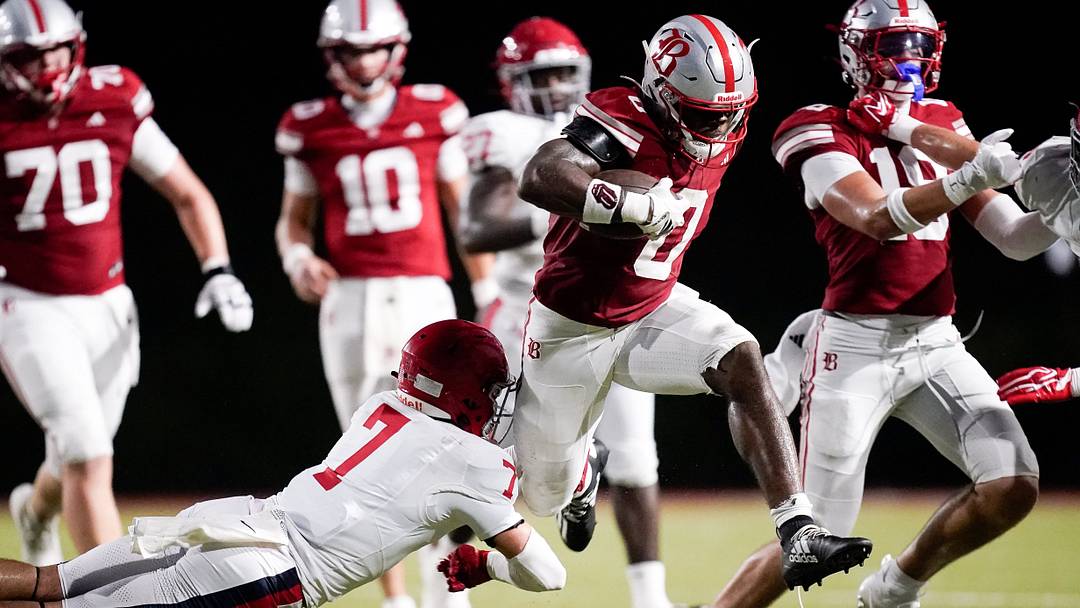 Baylor's David Gabriel-Georges (0) tries to evade Brentwood Academy's Hill Strong (7) during the first half at Baylor in Chattanooga, Tenn., Thursday, Aug. 20, 2026.