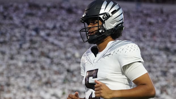 Oregon Ducks Dante Moore Quarterback NFL Draft Dan Lanning Penn State Overtime Arch Manning ESPN Heisman Trophy Winner No 1