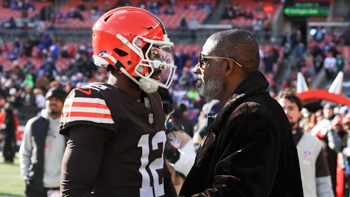 Dec 21, 2025; Cleveland, Ohio, USA;  Cleveland Browns quarterback Shedeur Sanders (12) with father Deion Sanders prior to a game against the Buffalo Bills at Huntington Bank Field. Mandatory Credit: Scott Galvin-Imagn Images