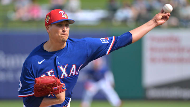 Feb 20, 2026; Surprise, Arizona, USA;  Texas Rangers pitcher Robert Garcia (62) delivers in the third inning against the Kansas City Royals at Surprise Stadium. Mandatory Credit: Jayne Kamin-Oncea-Imagn Images