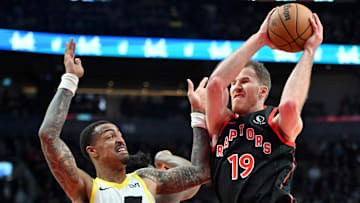 Dec 23, 2023; Toronto, Ontario, CAN;  Toronto Raptors center Jakob Poeltl (19) takes in a rebound
