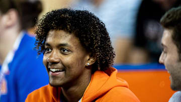 Florida Gators recruit Jaden Rashada smiles on the sideline during the second half against the Florida Gators at Steve Spurrier Field at Ben Hill Griffin Stadium in Gainesville, FL on Saturday, November 12, 2022. [Matt Pendleton/Gainesville Sun]