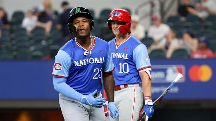 Jul 13, 2024; Arlington, TX, USA;  National League Future infielder Cam Collier (23) reacts in fron tof National League Future  infielder Aidan Miller (10) after hitting a home run during the third inning against the National League Future team during the Major league All-Star Futures game at Globe Life Field.  Mandatory Credit: Kevin Jairaj-Imagn Images