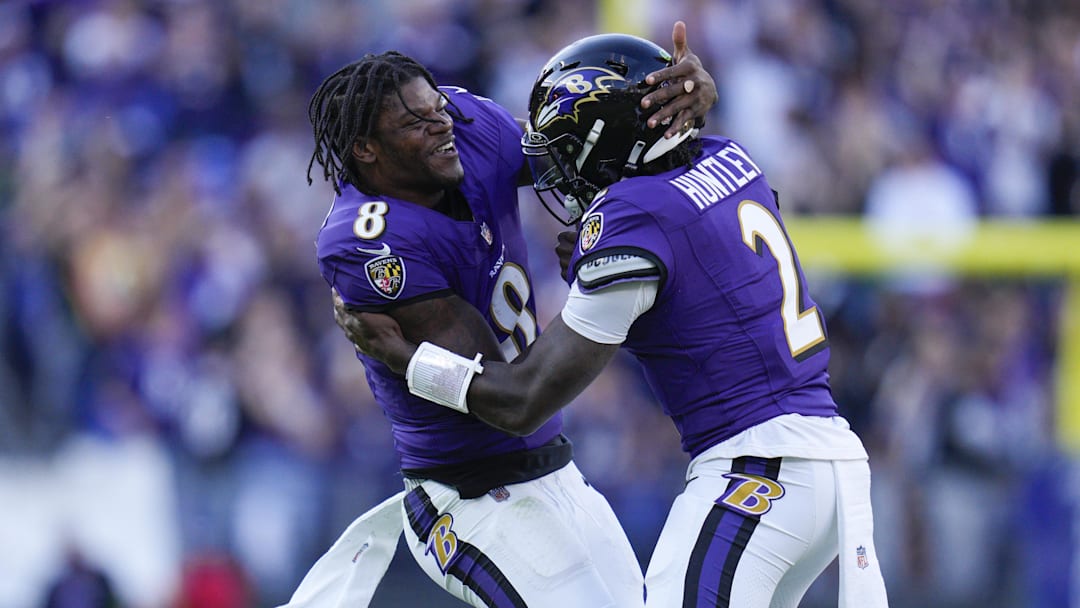 Nov 5, 2023; Baltimore, Maryland, USA;  Baltimore Ravens quarterback Tyler Huntley (2) celebrates his touchdown against the Seattle Seahawks with Baltimore Ravens quarterback Lamar Jackson (8) during the fourth quarter at M&T Bank Stadium. Mandatory Credit: Jessica Rapfogel-Imagn Images
