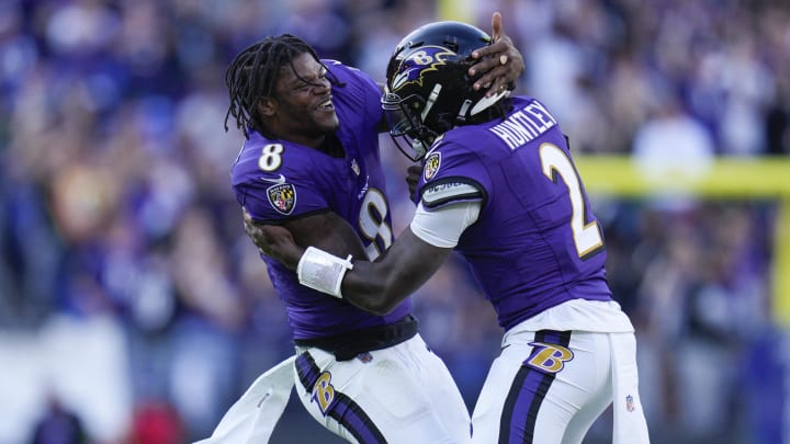 Nov 5, 2023; Baltimore, Maryland, USA;  Baltimore Ravens quarterback Tyler Huntley (2) celebrates his touchdown against the Seattle Seahawks with Baltimore Ravens quarterback Lamar Jackson (8) during the fourth quarter at M&T Bank Stadium. Mandatory Credit: Jessica Rapfogel-USA TODAY Sports