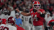 Georgia Bulldogs quarterback Gunner Stockton (14) looks to the sideline in the rezone during the second half of a NCAA college football game against Alabama in Athens, Ga., on Saturday, September 27, 2025.