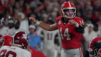 Georgia Bulldogs quarterback Gunner Stockton (14) looks to the sideline in the rezone during the second half of a NCAA college football game against Alabama in Athens, Ga., on Saturday, September 27, 2025.