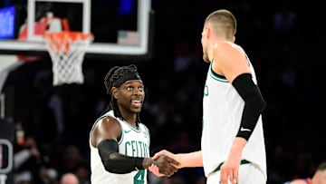 Former Boston Celtics players Jrue Holiday, Kristaps Porzingis