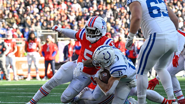 New England Patriots safety Jabrill Peppers (5) tackles Indianapolis Colts wide receiver Michael Pittman Jr.