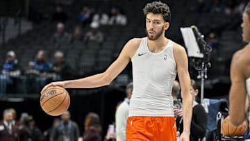 Dec 2, 2023; Dallas, Texas, USA; Oklahoma City Thunder forward Chet Holmgren (7) warms up before the game between the Dallas Mavericks and the Oklahoma City Thunder  at the American Airlines Center. Mandatory Credit: Jerome Miron-Imagn Images