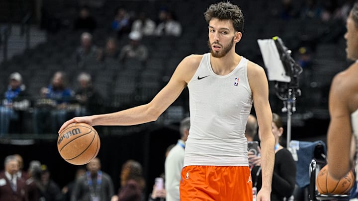 Dec 2, 2023; Dallas, Texas, USA; Oklahoma City Thunder forward Chet Holmgren (7) warms up before the game between the Dallas Mavericks and the Oklahoma City Thunder  at the American Airlines Center. Mandatory Credit: Jerome Miron-Imagn Images