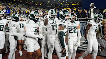 Michigan State players take the field for warm up before the Michigan game at Michigan Stadium in Ann Arbor on Saturday, Oct. 26, 2024.