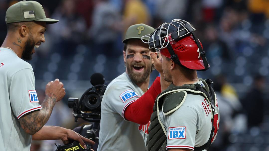 May 16, 2026; Pittsburgh, Pennsylvania, USA; Philadelphia Phillies starting pitcher Cristopher Sánchez (left) and first baseman Bryce Harper (middle) and catcher J.T. Realmuto (10) celebrate after a complete game shutout against the Pittsburgh Pirates at PNC Park. May 16, 2026; Pittsburgh, Pennsylvania, USA; Philadelphia Phillies starting pitcher Cristopher Sánchez (left) and first baseman Bryce Harper (middle) and catcher J.T. Realmuto (10) celebrate after a complete game shutout against the Pittsburgh Pirates at PNC Park.