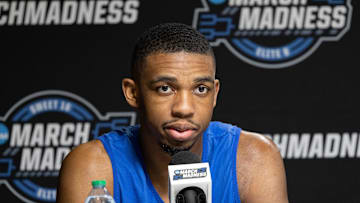 Mar 27, 2025; Indianapolis, IN, USA; Kentucky Wildcats guard Lamont Butler (1)  talks to the media during practice day at Lucas Oil Stadium. Mandatory Credit: Trevor Ruszkowski-Imagn Images