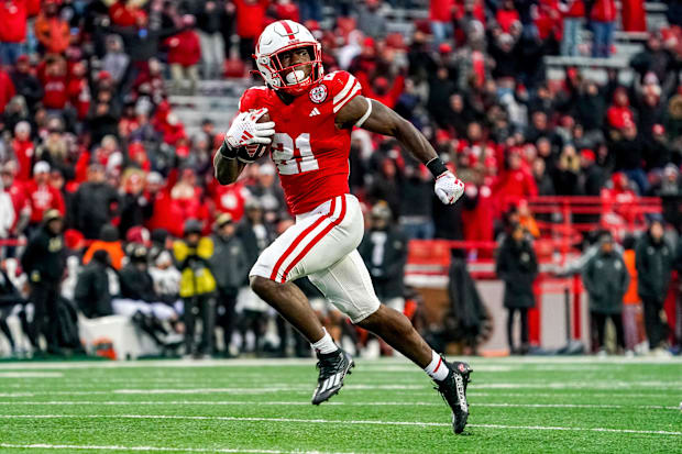 Nebraska Cornhuskers running back Emmett Johnson runs for a touchdown against the Purdue Boilermakers in 2023.