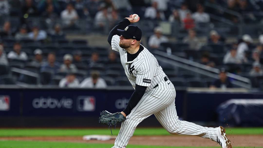 Sep 30, 2026; Bronx, New York, USA;  New York Yankees pitcher David Bednar (53) delivers a pitch in the eighth inning against the Boston Red Sox during game two of the Wildcard round for the 2026 MLB Playoffs at Yankee Stadium.  Mandatory Credit: Vincent Carchietta-Imagn Images