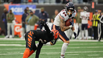 Nov 2, 2025; Cincinnati, Ohio, USA; Chicago Bears tight end Colston Loveland (84) runs with the ball for a 58-yard touchdown play against Cincinnati Bengals safety Jordan Battle (27) during the fourth quarter at Paycor Stadium. Mandatory Credit: Joseph Maiorana-Imagn Images