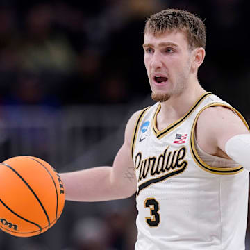 Purdue Boilermakers guard Braden Smith (3) points up the court to his teammates 