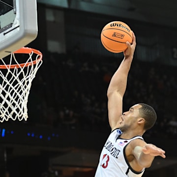 Mar 24, 2024; Spokane, WA, USA; San Diego State Aztecs forward Jaedon LeDee (13) dunks the ball in the second half against the Yale Bulldogs at Spokane Veterans Memorial Arena. Mandatory Credit: James Snook-Imagn Images