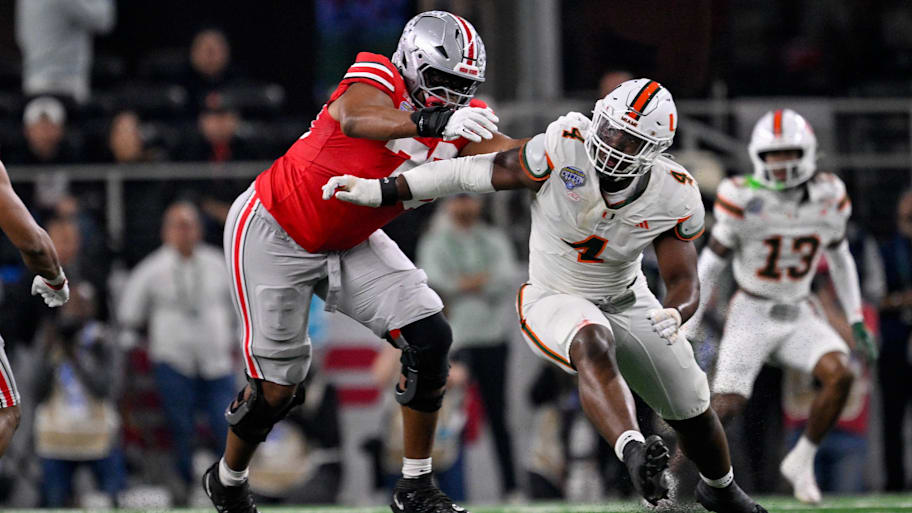 Miami Hurricanes defensive lineman Rueben Bain Jr. rushes against the Ohio State offensive line.