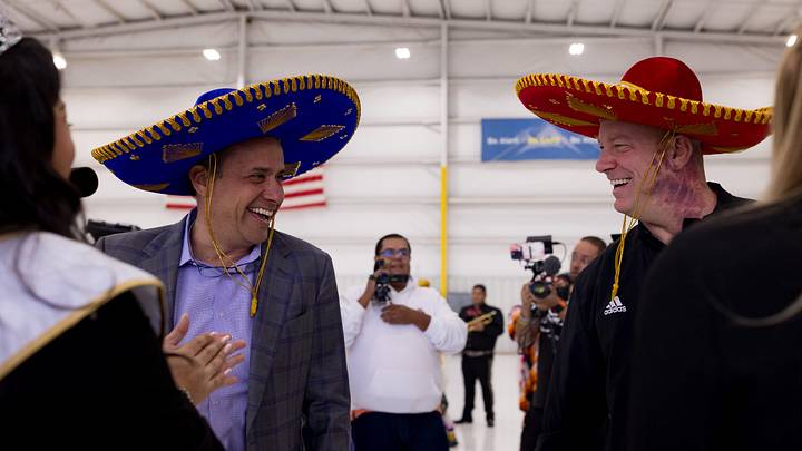 Jedd Fisch, Washington's head football coach, and Jeff Brohm, head Louisville football coach, were welcomed with sombreros as they arrived in El Paso on Thursday, Dec. 26, 2024, for the 2024 Tony the Tiger Sun Bowl.