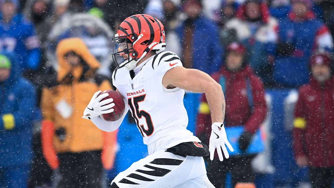 Dec 7, 2025; Orchard Park, New York, USA; Cincinnati Bengals wide receiver Charlie Jones (15) returns the opening kickoff against the Buffalo Bills at Highmark Stadium. Mandatory Credit: Mark Konezny-Imagn Images