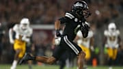 Mississippi State Bulldogs wide receiver Brenen Thompson (0) runs after a catch for a touchdown during the fourth quarter against the Arizona State Sun Devils at Davis Wade Stadium at Scott Field.