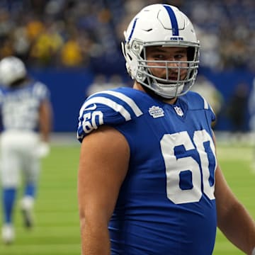 Indianapolis Colts guard Tanor Bortolini (60) warms up before a game against the Pittsburgh Steelers on Sunday, Sept. 29, 2024, at Lucas Oil Stadium in downtown Indianapolis.