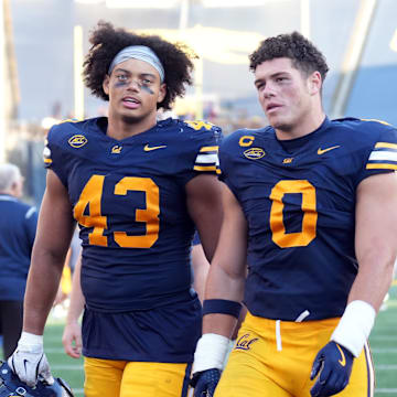 Cal outside linebacker Ryan McCulloch (43) and inside linebacker Cade Uluave 