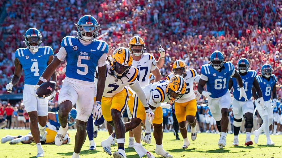 Ole Miss running back Kewan Lacy carries the ball in for a touchdown during a college football game between Ole Miss and LSU.