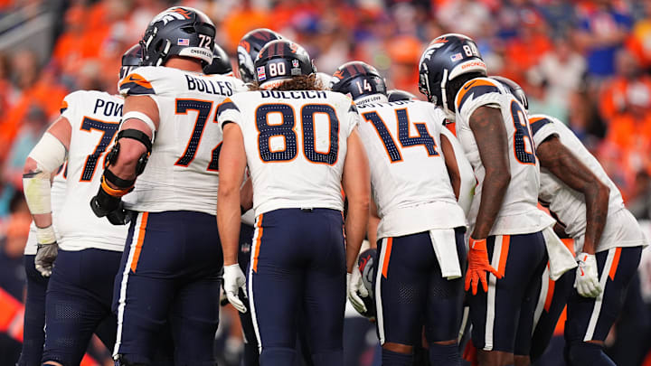 Sep 15, 2024; Denver, Colorado, USA; Members of the Denver Broncos offensive squad huddle in the second half against the Pittsburgh Steelers at Empower Field at Mile High. 