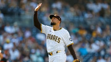 Sep 3, 2025; San Diego, California, USA; San Diego Padres relief pitcher Robert Suarez (75) celebrates after a strike out during the ninth inning against the Baltimore Orioles at Petco Park. Mandatory Credit: David Frerker-Imagn Images