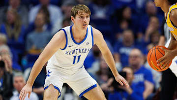 Nov 19, 2024; Lexington, Kentucky, USA; Kentucky Wildcats guard Travis Perry (11) defends during the second half against the Lipscomb Bisons at Rupp Arena at Central Bank Center. Mandatory Credit: Jordan Prather-Imagn Images